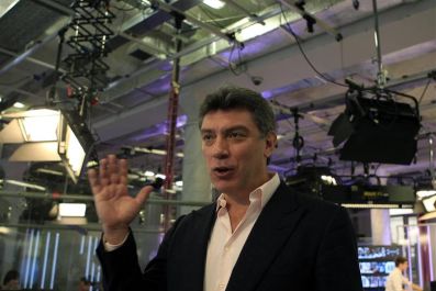 Russian opposition leader Boris Nemtsov gestures during a television interview in Moscow