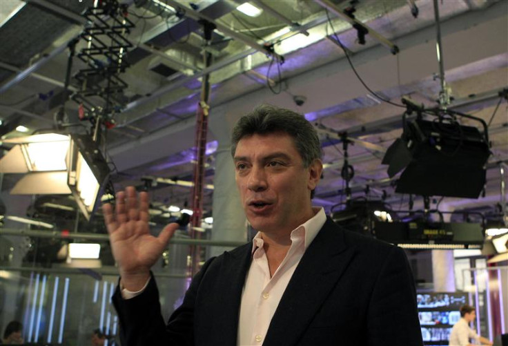 Russian opposition leader Boris Nemtsov gestures during a television interview in Moscow