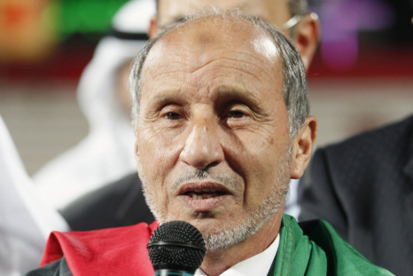 Libya&#039;s National Transitional Council Chairman Mustafa Abdul Jalil speaks during a charity football match in Dubai