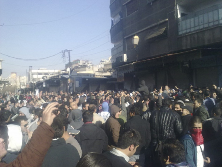 Demonstrators protest against Syria's President Bashar al-Assad in al-Midan district in Damascus