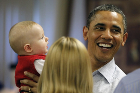 President Barack Obama with eight-month-old Cooper