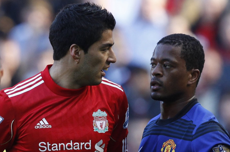 Evra and Suarez (REUTERS)