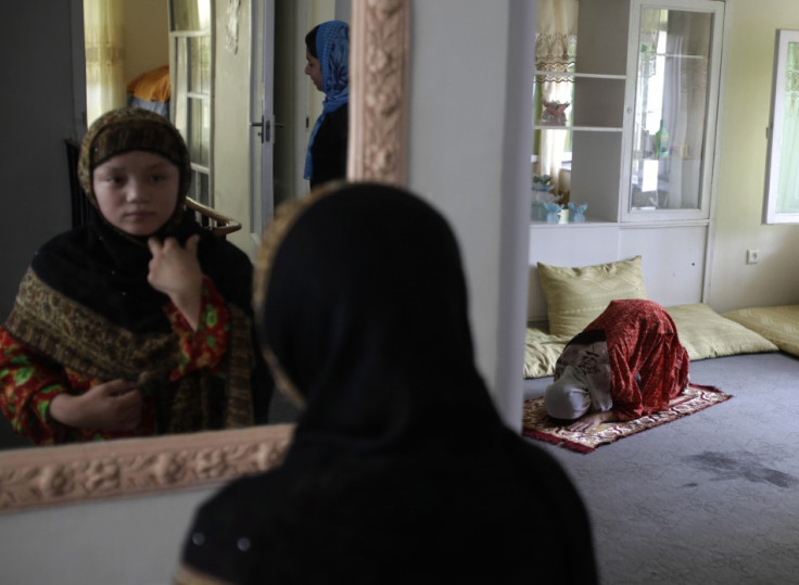 A woman prays at the Family Guidance Center in Kabul