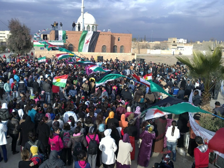 Demonstrators protest against Syrian President Bashar al-Assad in Amude