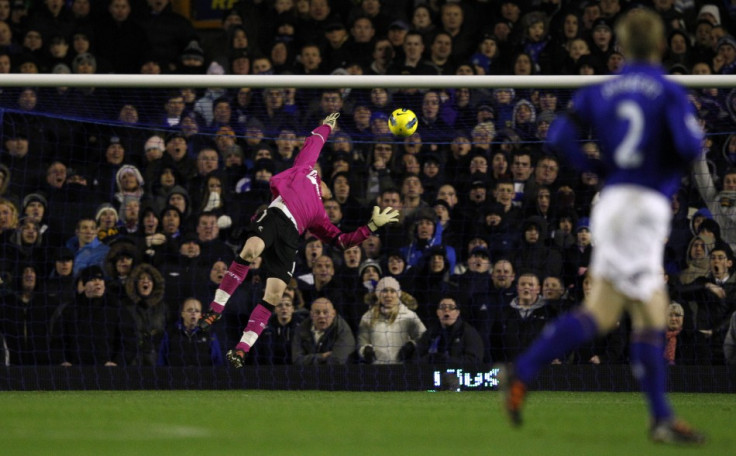 Everton&#039;s goalkeeper Tim Howard (unseen) scores past Bolton Wanderers&#039; Adam Bogdan