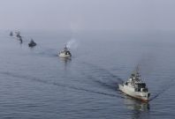 Ships participate in naval parade on Sea of Oman near Strait of Hormuz
