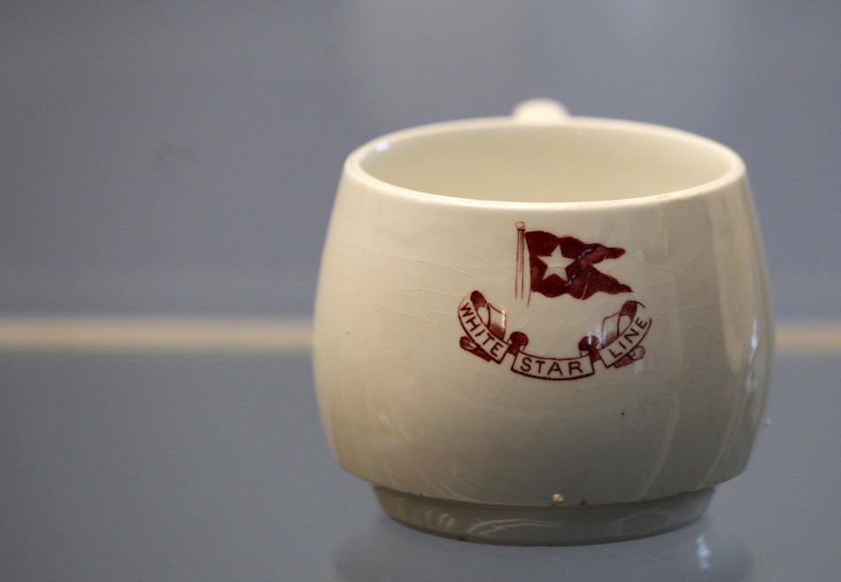A cup recovered from the RMS Titanic is on display during the Titanic Auction preview by Guernseys Auction House in New York