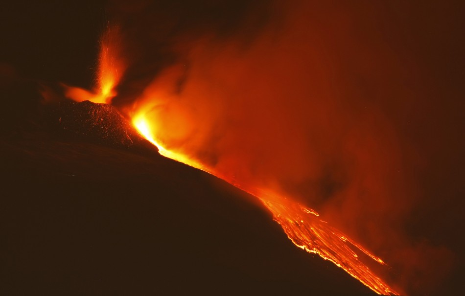 Mount Etna spews lava during an eruption on the southern Italian island of Sicily