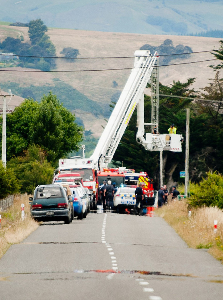Hot Air Balloon Tragedy: A forensic photographer takes pictures at the scene of a hot air balloon crash near Caterton in New Zealand on 07/01/2012.