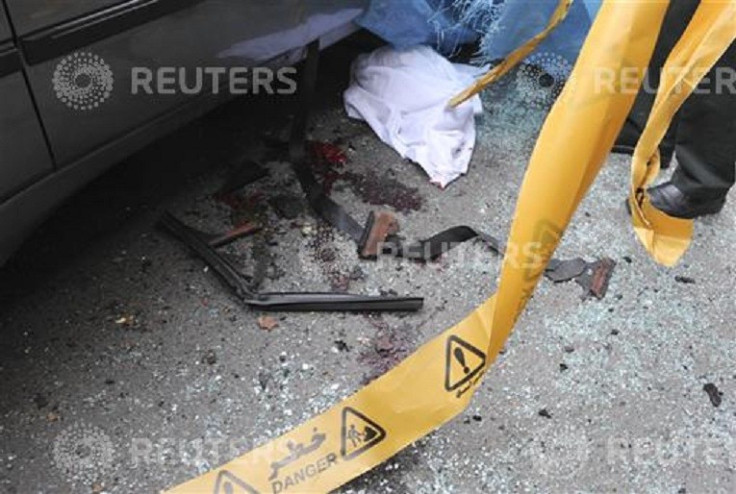 Bloodstains are seen next to the car belonging to Iranian nuclear scientist killed in  a blast in Tehran