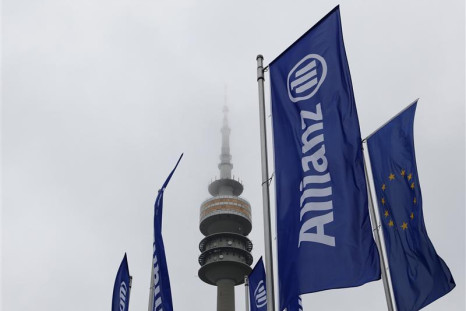 German insurer Allianz flags are seen in front of Munich&#039;s radio tower before shareholders&#039; meeting