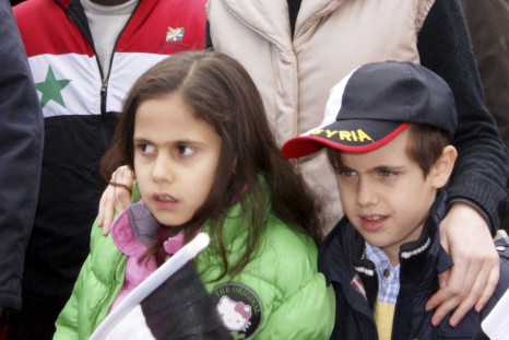 Asma, wife of Syrian President Bashar al-Assad, with her two children,
