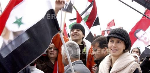 Asma, the wife of Syrian President Bashar al-Assad, makes an appearance during a rally in support of her husband in Damascus