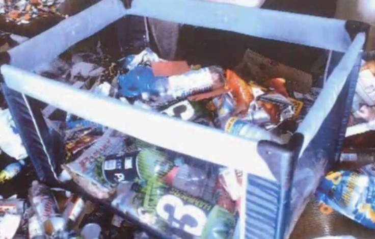 Declan Hainey's playpen where he slept was filled with empty plastic cider bottles and debris