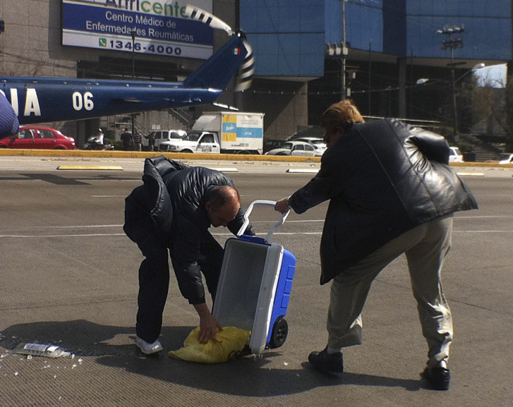 Medical staff drop a donor heart on to the pavement outside a hospital in Mexico City