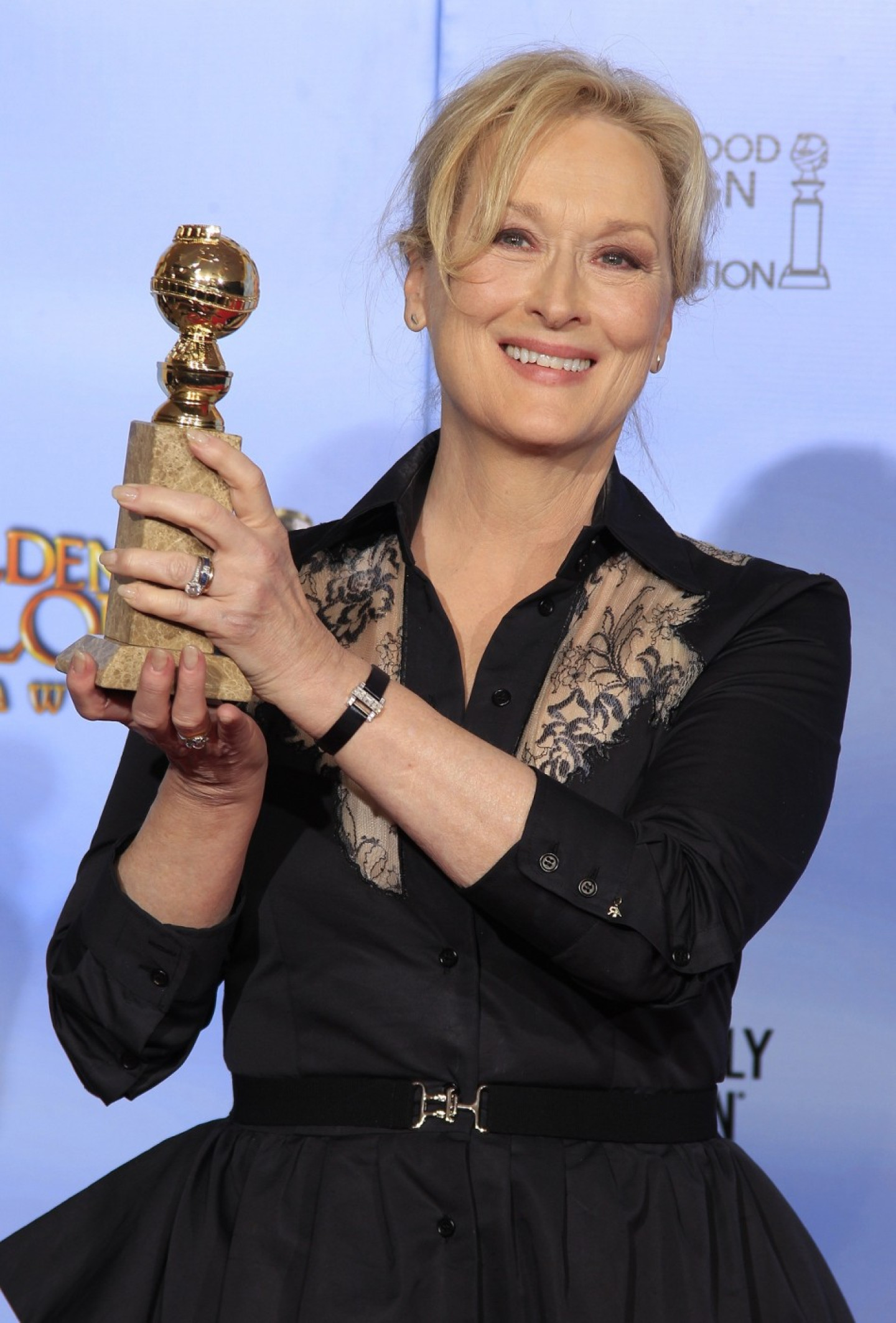 Meryl Streep, winner of best performance by an actress in a drama motion picture for her role in &quot;The Iron Lady&quot;, poses in the photo room in Beverly Hills (Reuters)