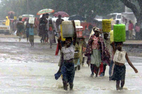 Mozambique villagers struggle through heavy rain in tropical depression Dando