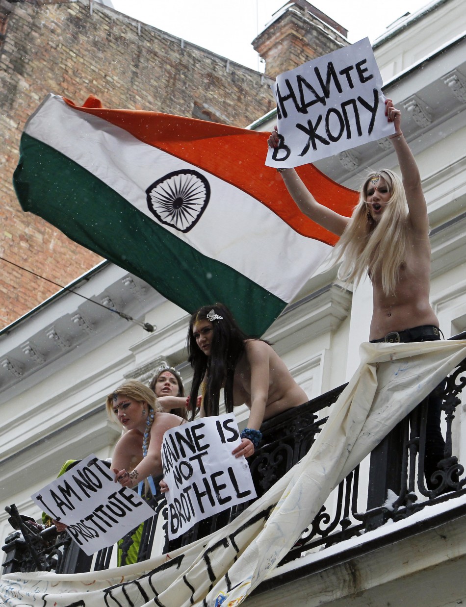 Activists from Femen bared their breasts and occupied the second floor of the building in Kiev