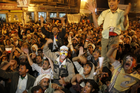 Anti-government protesters shout slogans in Sanaa