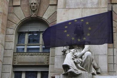 An EU flag flies on the frontage of the National Bank of Hungary building in Budapest