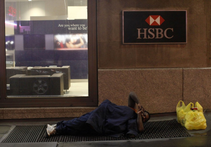 Homeless man outside a bank