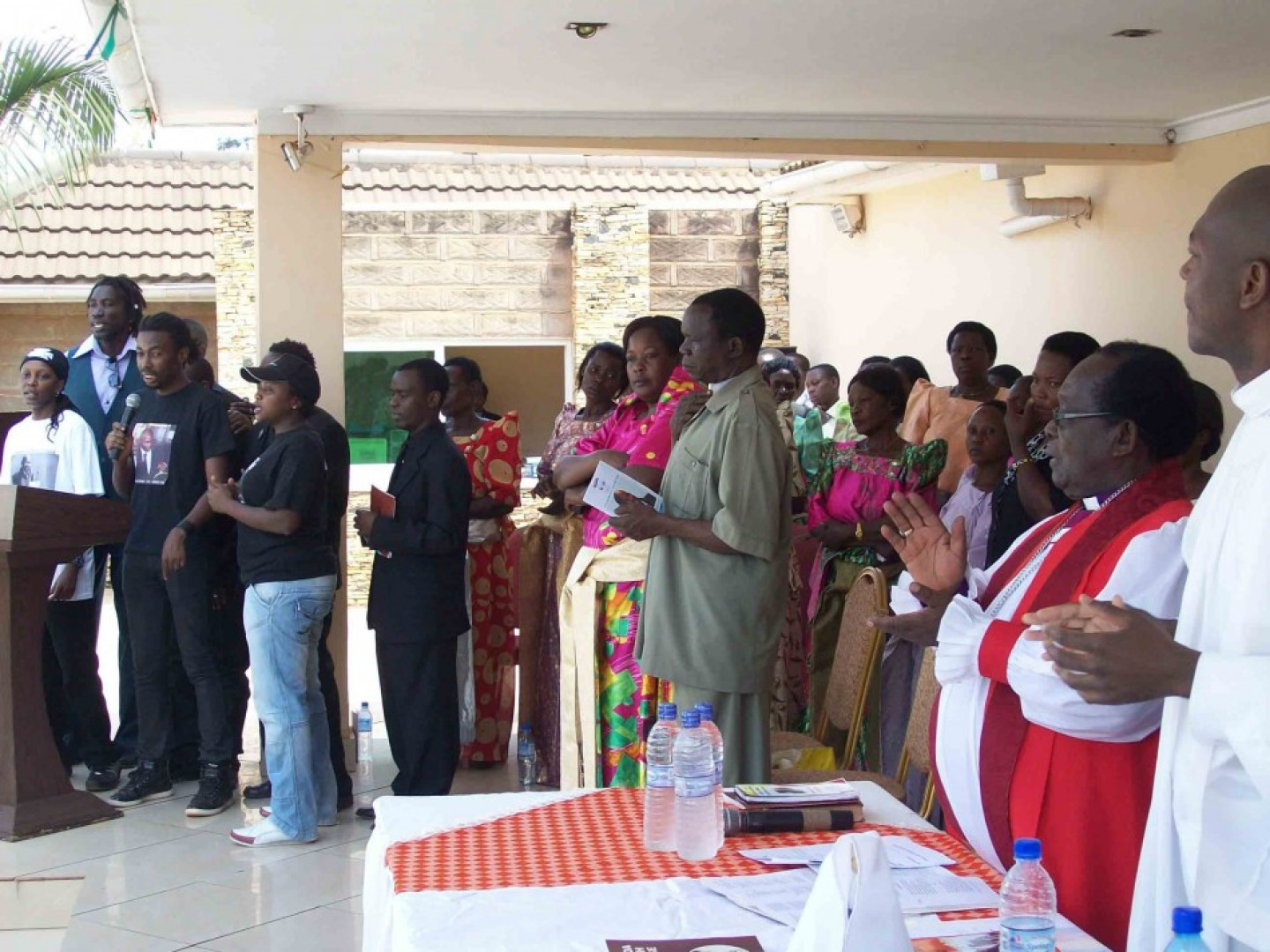 Bishop Christopher Senyonjo (second right) at the service to remember Ugandan gay activist David Kato