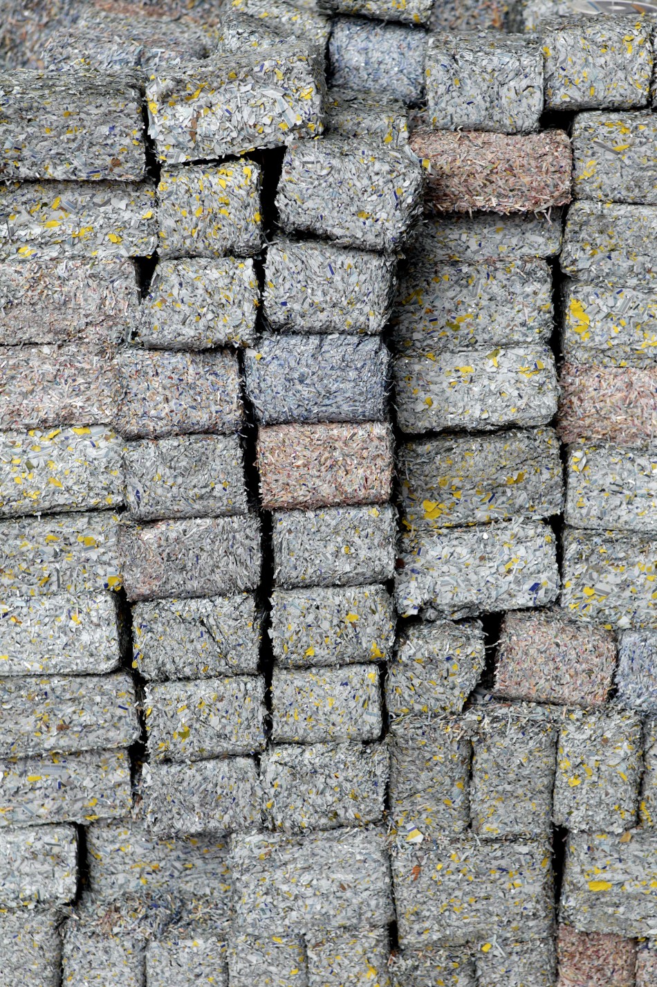 Bricks of shredded money are stacked in the 1.4 billion home.