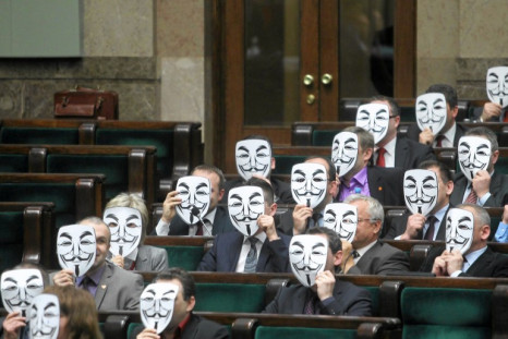 Members of Ruch Palikota Party wear masks