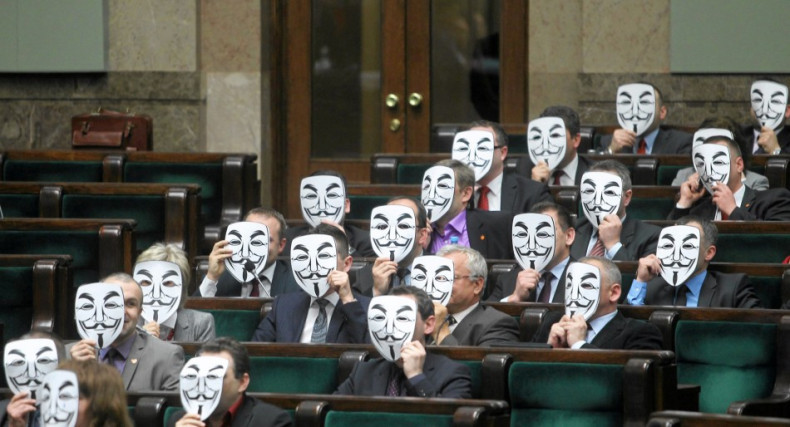 Members of Ruch Palikota Party wear masks