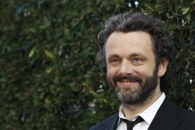Cast member Michael Sheen poses at the premiere of &#039;&#039;Midnight in Paris&#039;&#039; at the Samuel Goldwyn Theatre in Beverly Hills, California