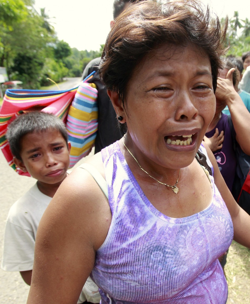 Earthquake survivors weep
