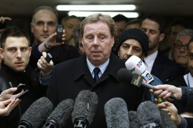 Tottenham Hotspur soccer manager Harry Redknapp speaks to members of the media as he leaves Southwark Crown Court in London