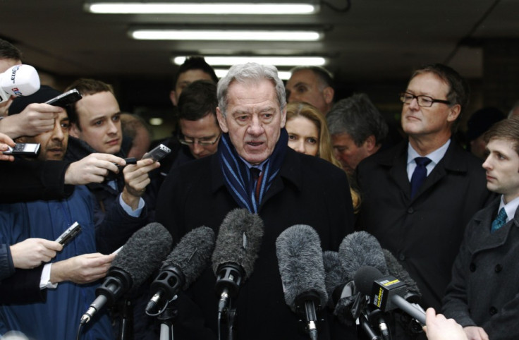 Milan Mandaric speaks to members of the media as he leaves Southwark Crown Court in London