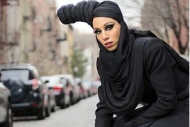 Muslim model demonstrates how to dress fashionably, yet modestly