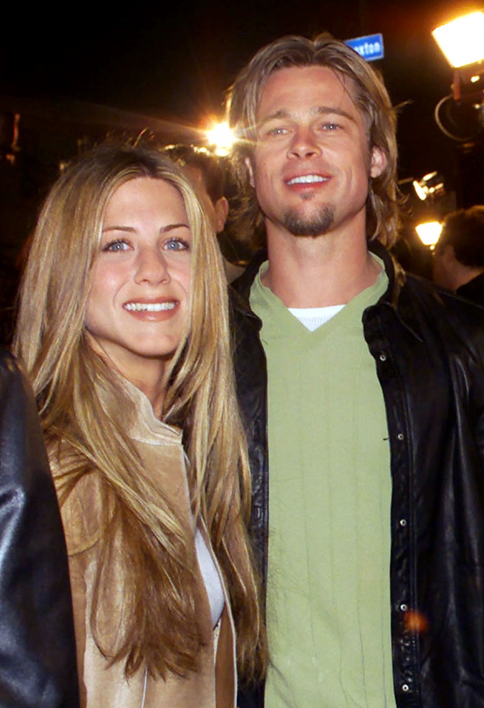 Actress Jennifer Aniston L and then boyfriend and actor Brad Pitt