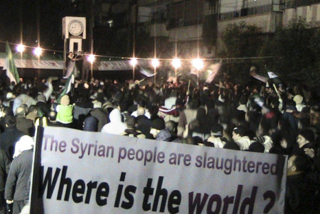 Demonstrators gather during a protest against Syria&#039;s President Bashar al-Assad in Homs February 10, 2012.
