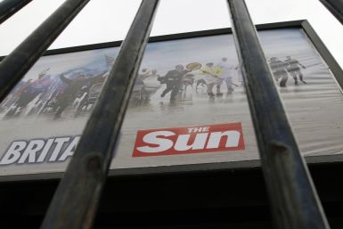 An advertisement for The Sun newspaper is seen on a billboard outside News International's Wapping headquarters in London on Jan. 28, 2012.