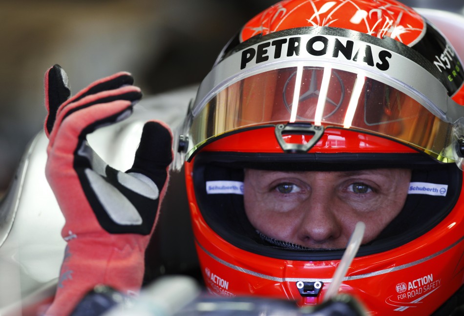 Mercedes F1 driver Schumacher of Germany is seen in the garage during a training session at the Jerez racetrack