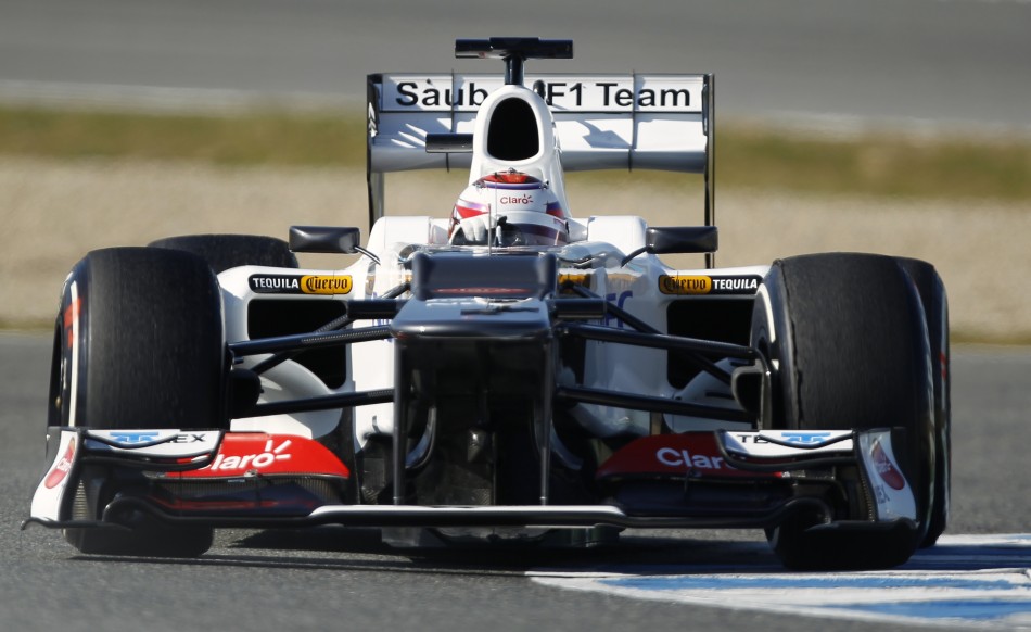 Sauber Formula One driver Kobayashi of Japan drives his C31-Ferrari in Jerez