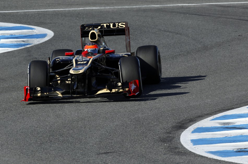 Lotus Formula One driver Romain Grosjean of France takes a curve in Jerez