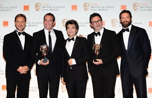 Jean Dujardin, Thomas Langmann and Michel Hazanavicius flanked by Russell Crowe and Hugh Jackman
