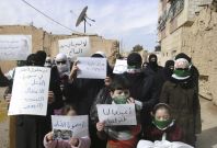 Demonstrators gather during a protest against Syria&#039;s President Bashar al-Assad in Daria, near Damascus