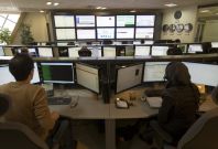 Technicians monitor data flow in the control room of an internet service provider in Tehran .