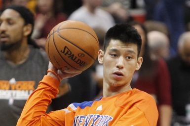 New York Knicks guard Jeremy Lin shoots baskets during warm-up before the start of game against Timberwolves in Minneapolis