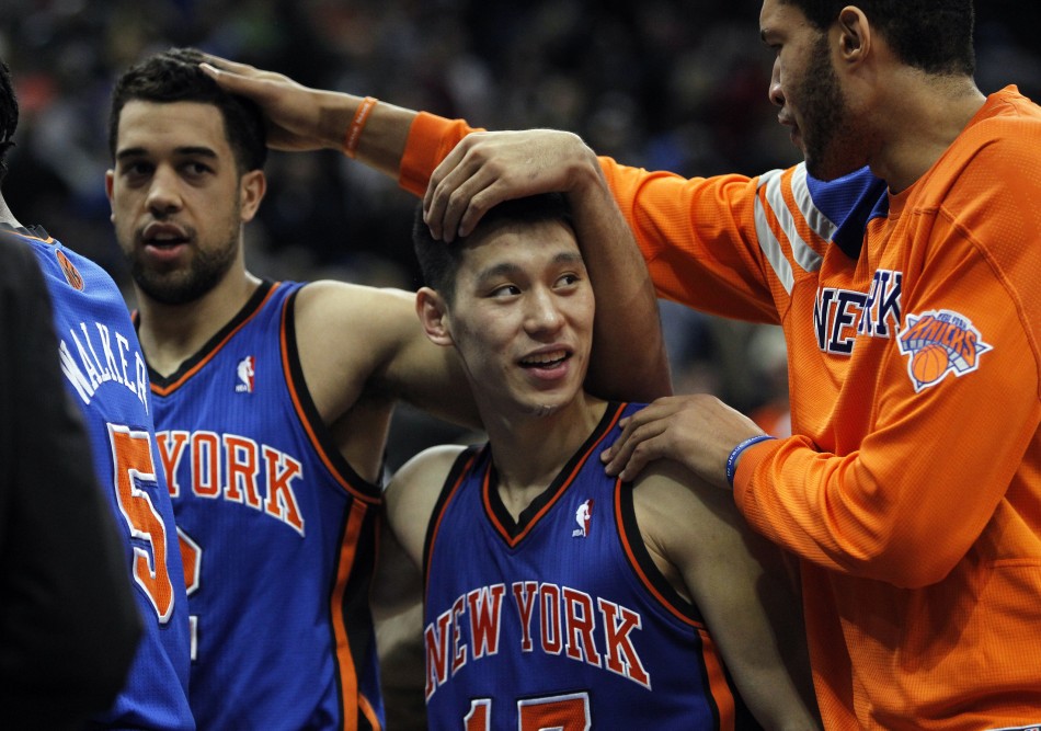 New York Knicks039 Lin is congratulated by teammates Jordan and Fields after win against Timberwolves in Minneapolis