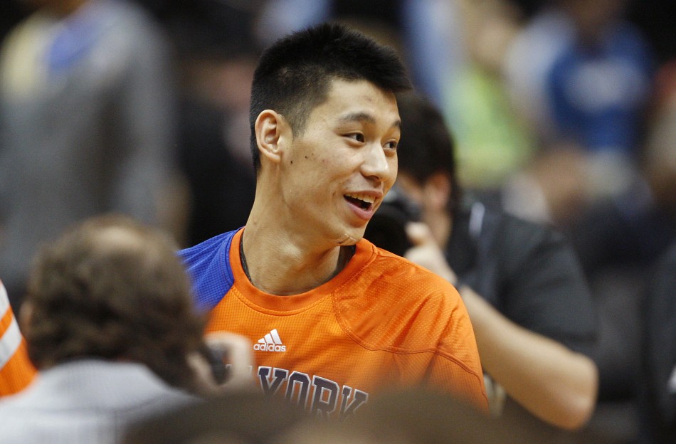 knicks guard Lin smiles during player introductions before the start of the Knicks039 NBA basketball game against the Timberwolves in Minneapolis