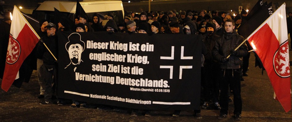 Right wing supporters walk through the city of Dresden February 13, 2012 to stage a funeral march in memory of the victims of the Allied air raid that flattened the city 67 years ago