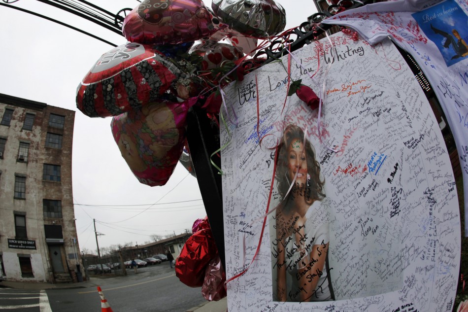 Part of a makeshift memorial for the late singer Whitney Houston is seen in Newark