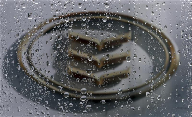 The Bank of Ireland logo is seen through raindrops on a window in Dublin