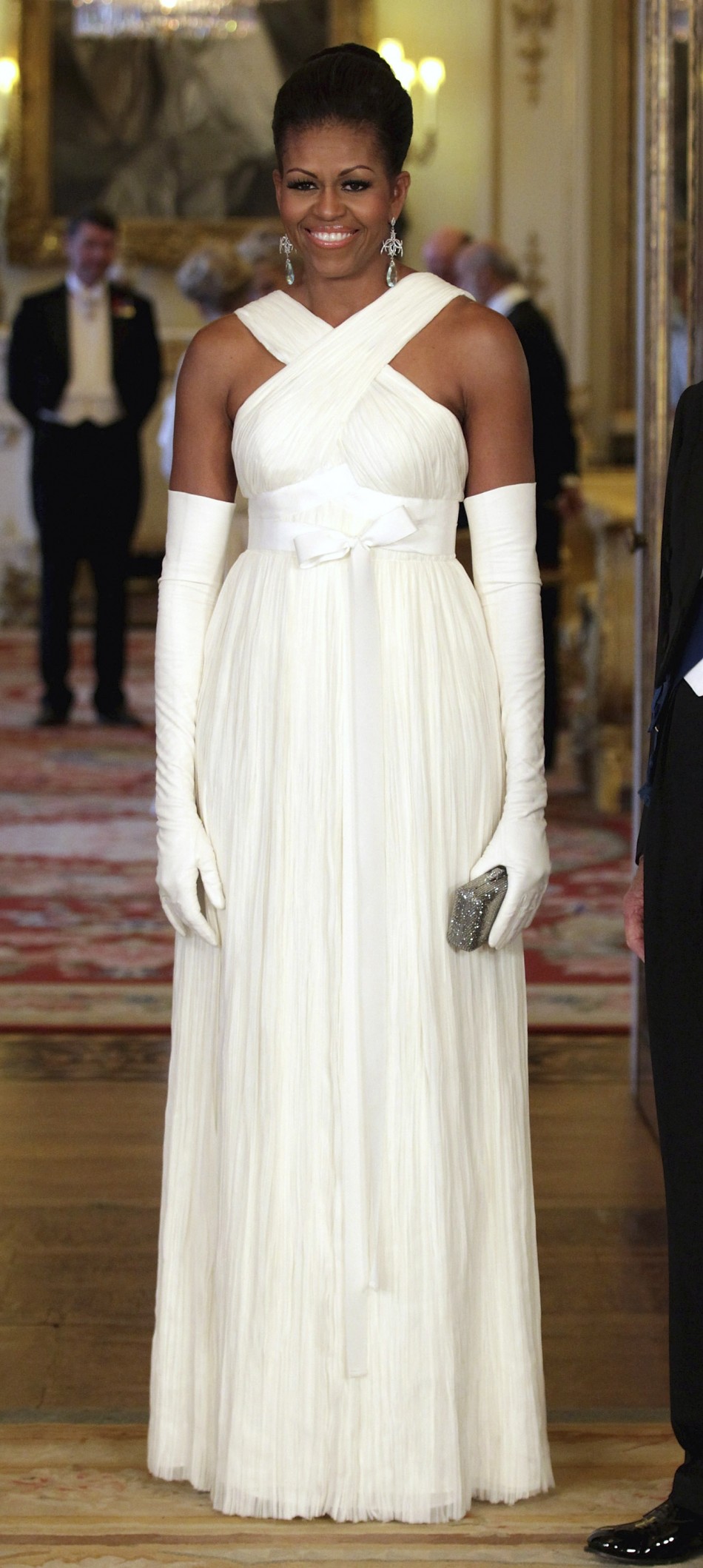 U.S first lady Michelle Obama poses for a photograph before a State Dinner at Buckingham Palace in London